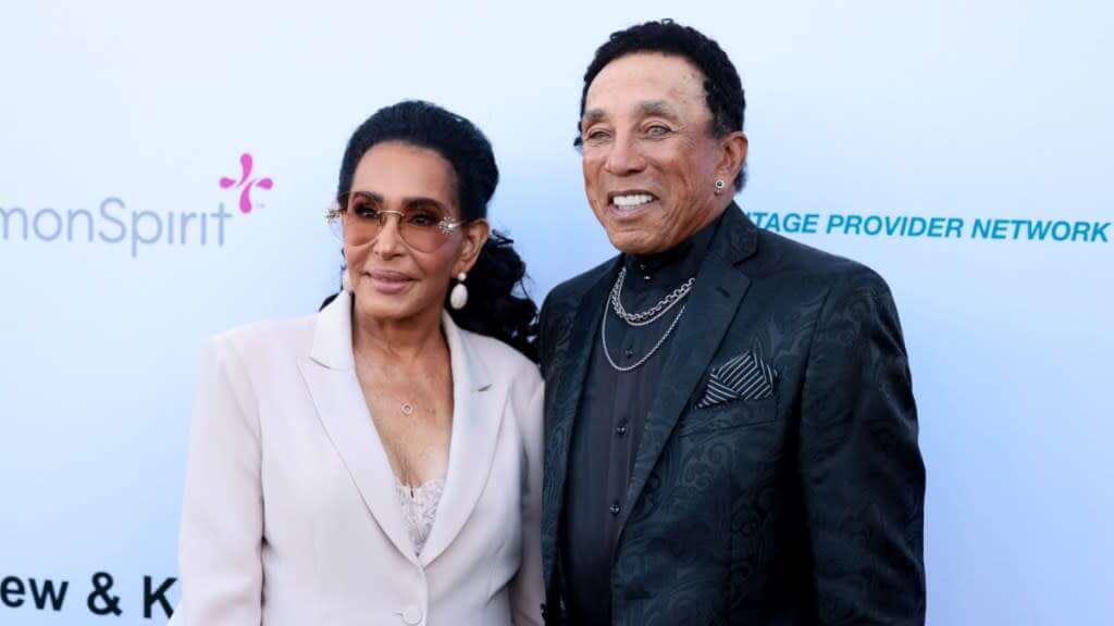 Smokey Robinson with wife